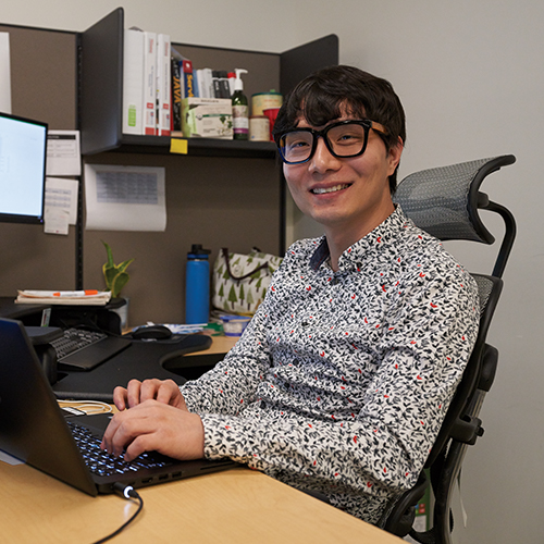 IT employee at his desk