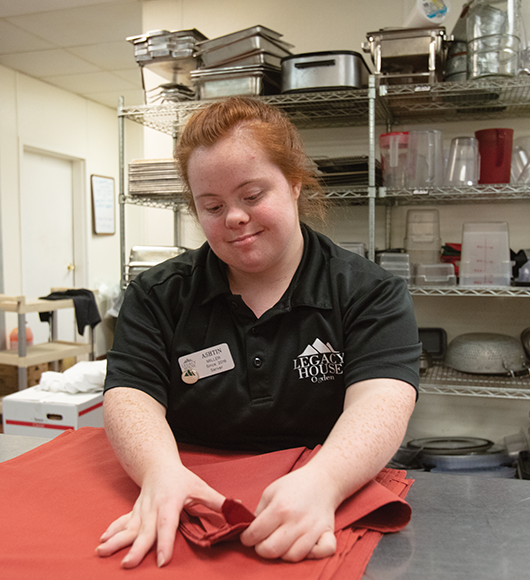Girl Folding Napkins