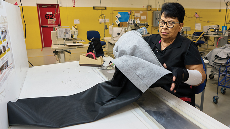 Generating cost savings woman working at station