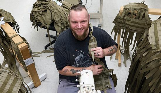 Man making military vests