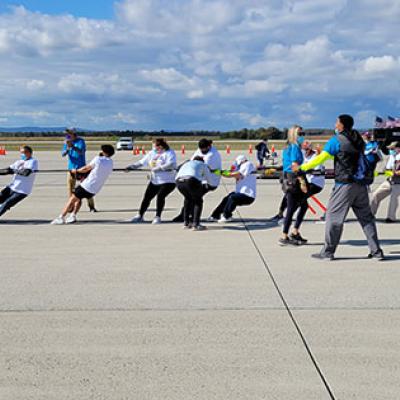 SourceAmerica competing at the Plane Pull